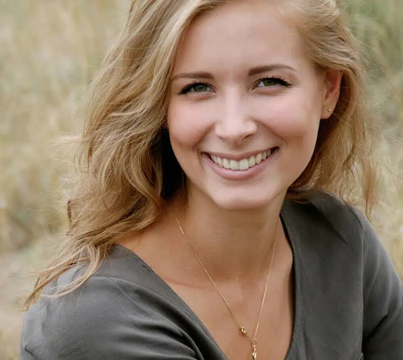 Woman with healthy, radiant skin following professional skincare